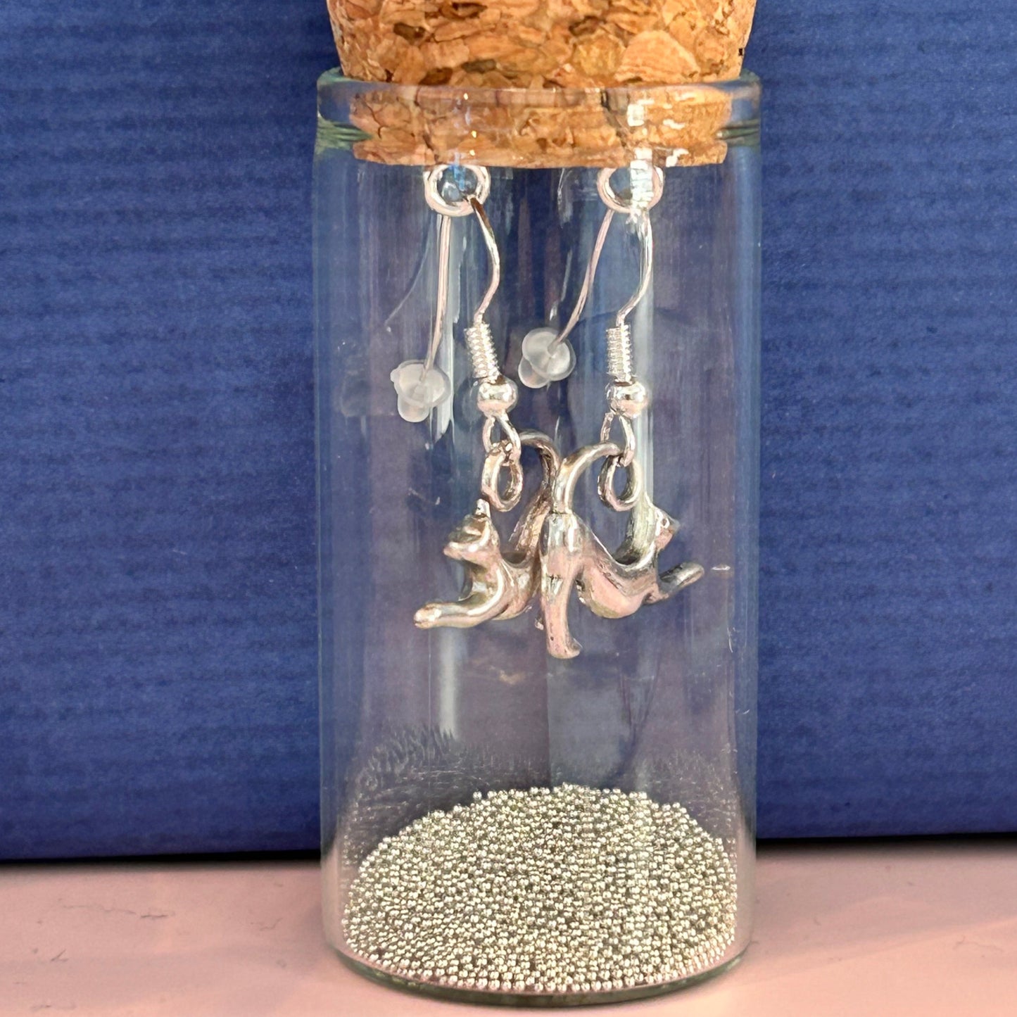 Zamsoe Stretching Cat Earrings in a Bottle